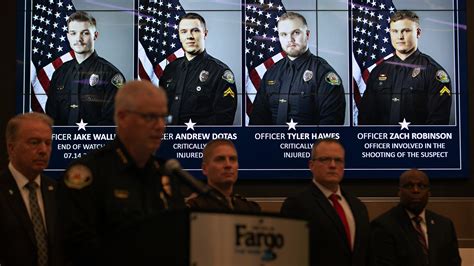Gunman who shot Fargo officers had 1,800 rounds, multiple guns, grenade in car, officials say
